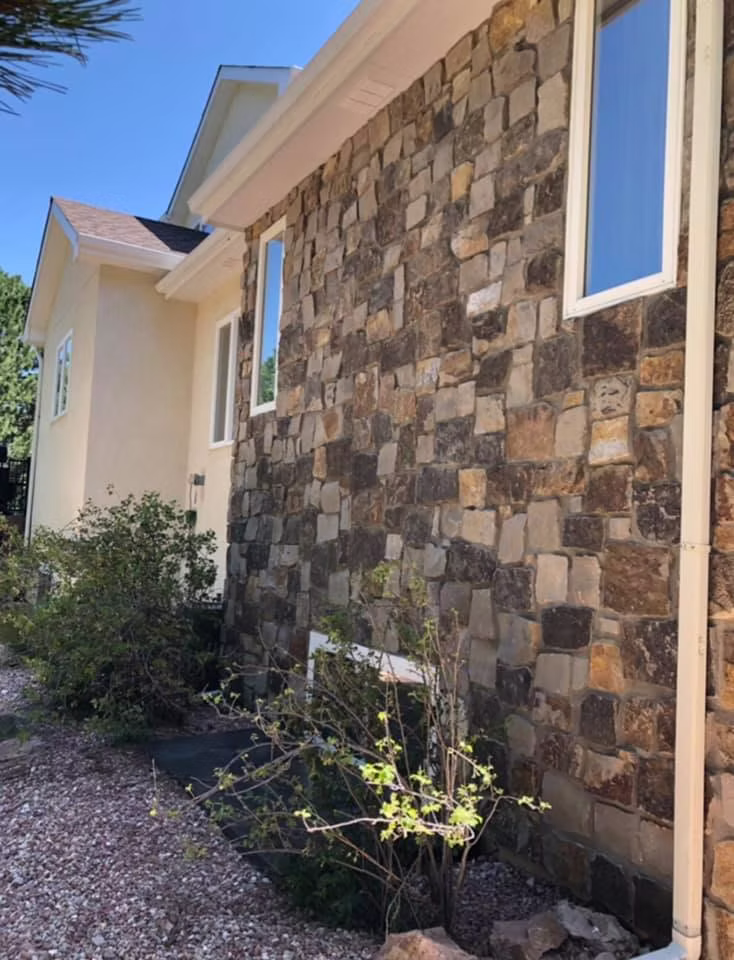 Custom Colorado home with stone veneer and masonry exterior