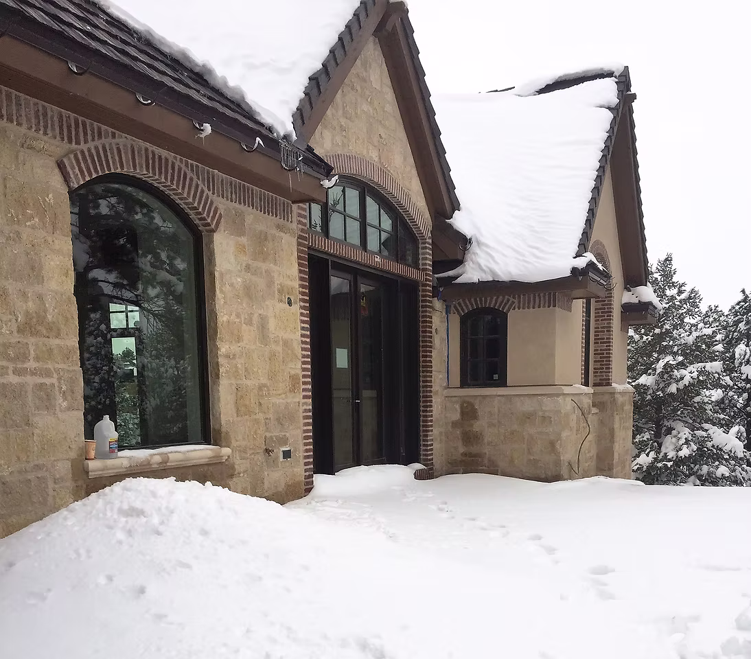 Custom Colorado home with stone veneer and masonry exterior