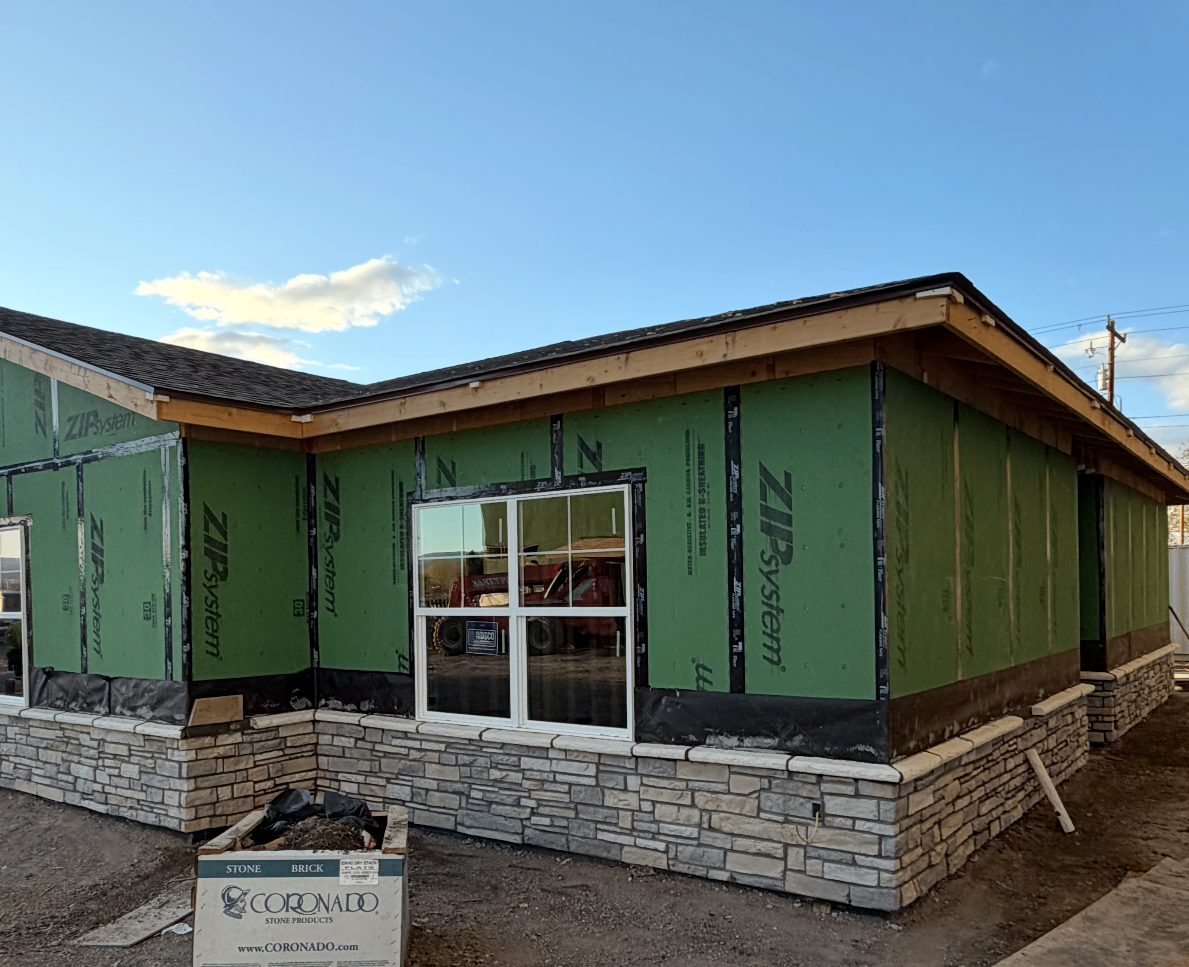 Custom Colorado home with stone veneer and masonry exterior