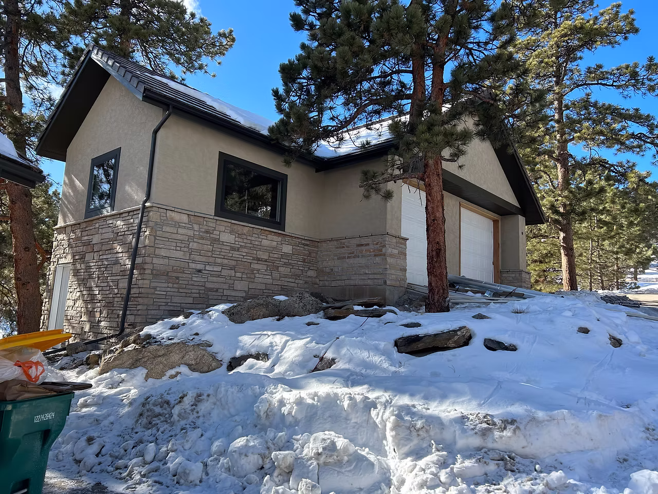 Custom Colorado home with stone veneer and masonry exterior