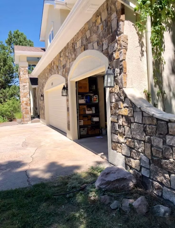Custom Colorado home with stone veneer and masonry exterior
