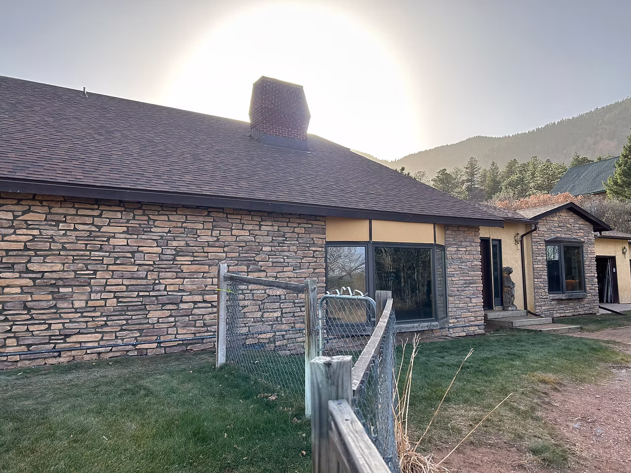 Custom Colorado home with stone veneer and masonry exterior