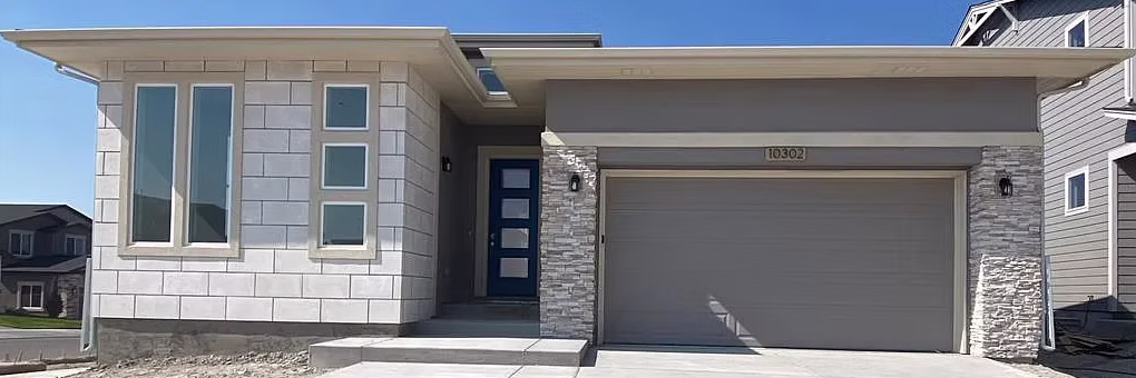Custom Colorado home with stone veneer and masonry exterior